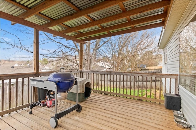 wooden terrace featuring grilling area