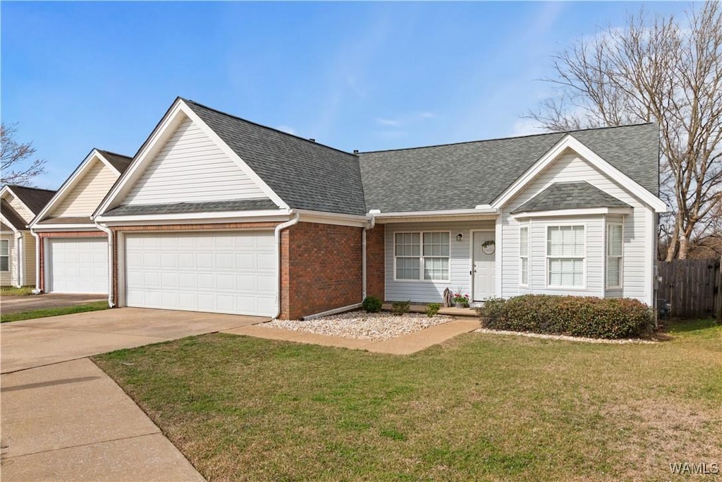 ranch-style house with brick siding, fence, a front yard, driveway, and an attached garage