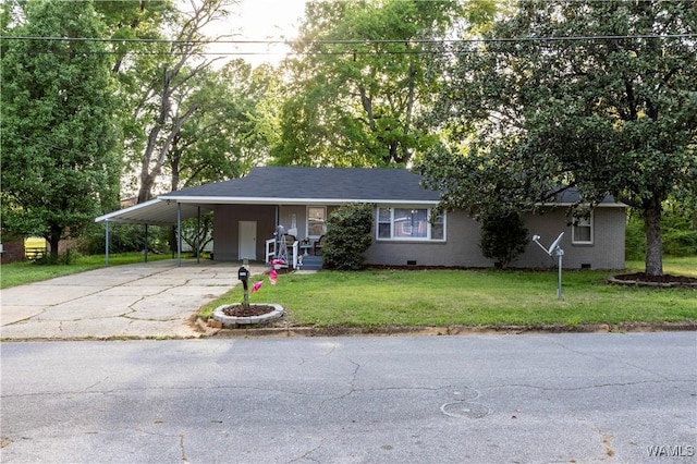 2516 17th Ave, Northport, AL 35476 - ranch-style home featuring an attached carport, driveway, crawl space, and a front yard