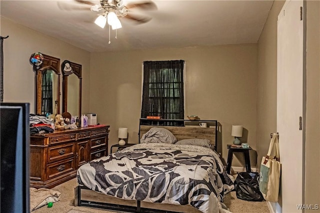 2516 17th Ave, Northport, AL 35476 - carpeted bedroom with a ceiling fan