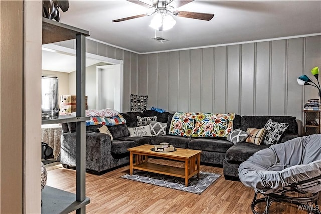 2516 17th Ave, Northport, AL 35476 - living room with ceiling fan, crown molding, and light wood finished floors