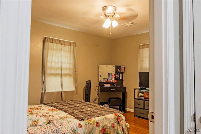 2516 17th Ave, Northport, AL 35476 - bedroom featuring wood finished floors and visible vents