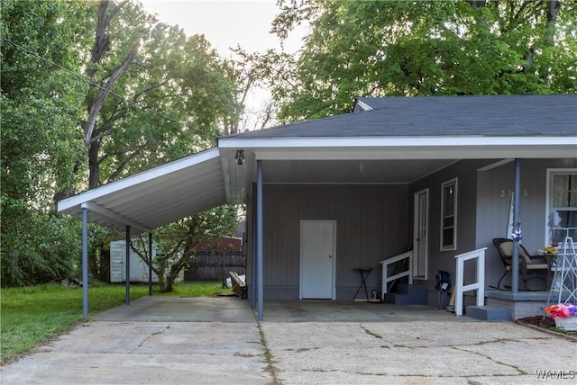2516 17th Ave, Northport, AL 35476 - view of vehicle parking featuring driveway, a carport, and fence