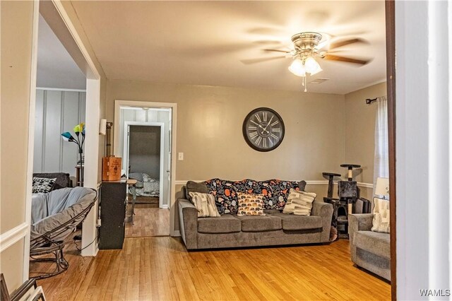 2516 17th Ave, Northport, AL 35476 - living room featuring light wood finished floors and ceiling fan
