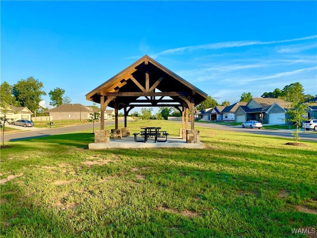 view of property's community featuring a gazebo and a yard