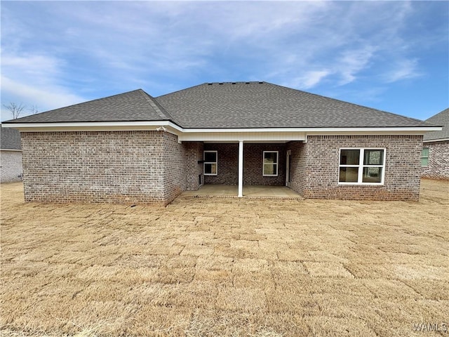 back of property with a patio area