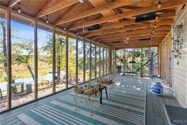 unfurnished sunroom featuring a healthy amount of sunlight