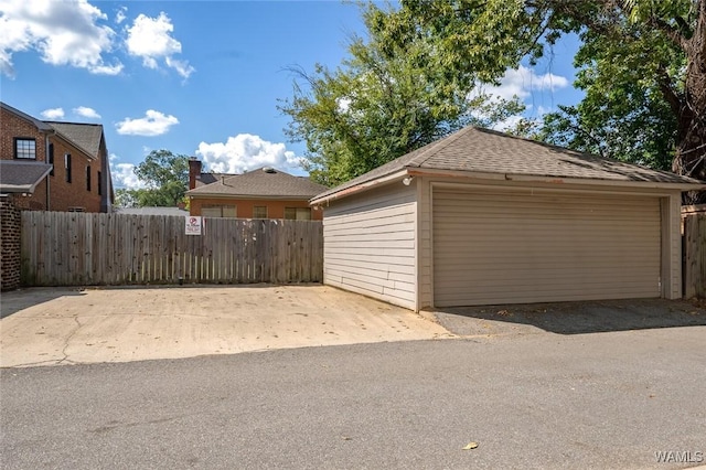 garage featuring fence