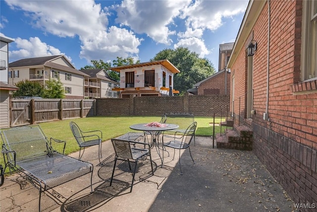 view of patio / terrace featuring a fenced backyard and outdoor dining area