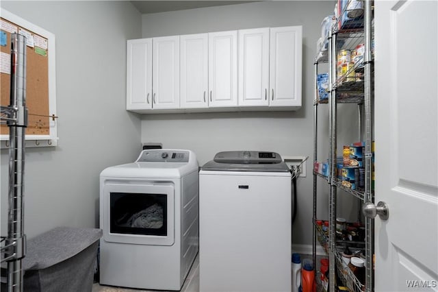 2603 Lauren St, Northport, AL 35475 - washroom with cabinet space and separate washer and dryer