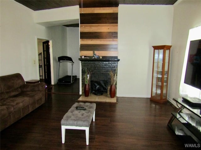 205 S Ash Ave, Demopolis, AL 36732 - living room featuring wood finished floors and a fireplace