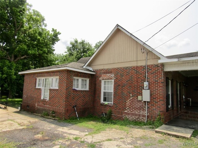 205 S Ash Ave, Demopolis, AL 36732 - view of side of property with brick siding and crawl space
