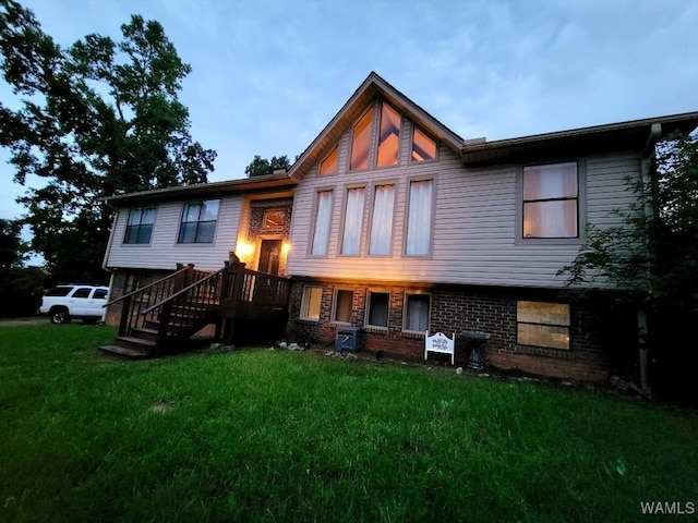 11647 Brown Cir, Woodstock, AL 35188 - back of house featuring a lawn and brick siding