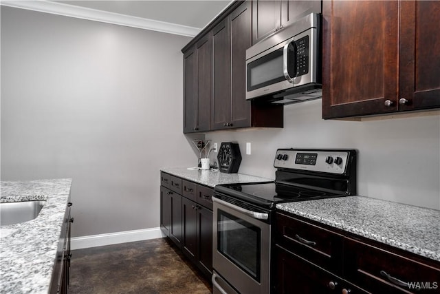 12030 Orlea Ln, Northport, AL 35475 - kitchen with appliances with stainless steel finishes, baseboards, crown molding, finished concrete flooring, and dark brown cabinetry