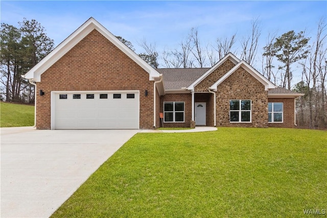 view of front of house featuring a garage and a front yard