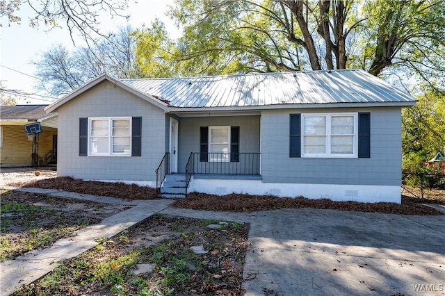 view of front of home featuring covered porch