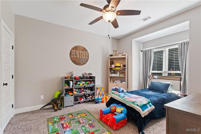 12625 Northside Rd, Northport, AL 35475 - carpeted bedroom with a ceiling fan and baseboards