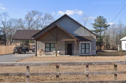 12625 Northside Rd, Northport, AL 35475 - view of front of house featuring driveway, board and batten siding, and a carport