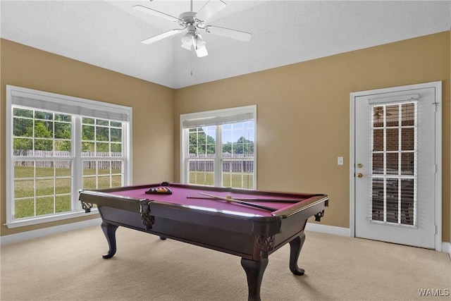 recreation room with pool table, baseboards, ceiling fan, light colored carpet, and lofted ceiling