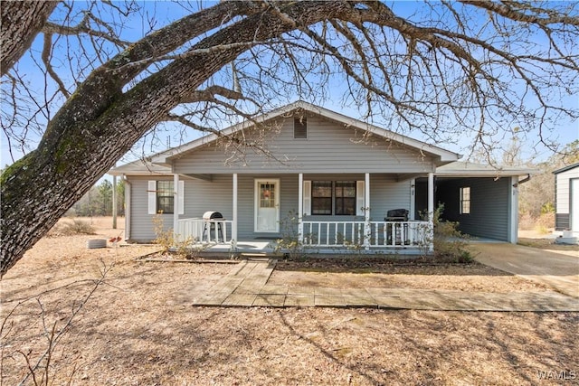 view of front of home featuring covered porch