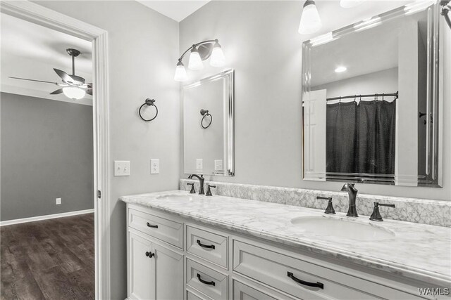 bathroom with tile patterned flooring and vanity