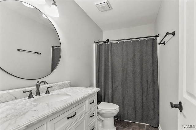 bathroom featuring tile patterned floors, vanity, toilet, and a shower with curtain