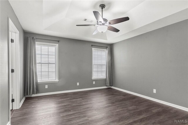 bathroom with hardwood / wood-style floors, ceiling fan, and vanity