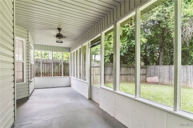 unfurnished sunroom with a wealth of natural light