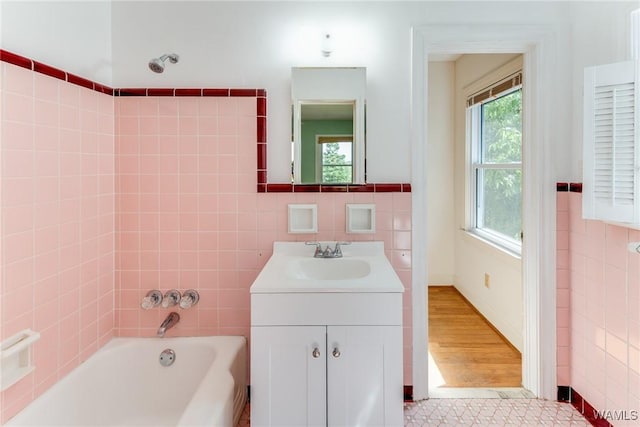 9C Country Club Hls, Tuscaloosa, AL 35401 - bathroom with a bathtub, vanity, and tile walls
