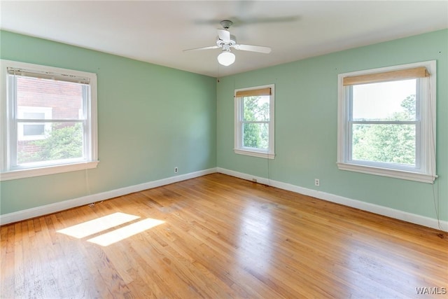 9C Country Club Hls, Tuscaloosa, AL 35401 - spare room featuring baseboards, wood finished floors, and ceiling fan