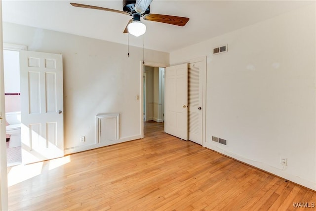 9C Country Club Hls, Tuscaloosa, AL 35401 - unfurnished bedroom with light wood-type flooring and baseboards