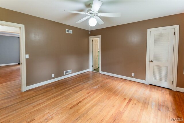 9C Country Club Hls, Tuscaloosa, AL 35401 - unfurnished bedroom with baseboards, light wood finished floors, and a ceiling fan