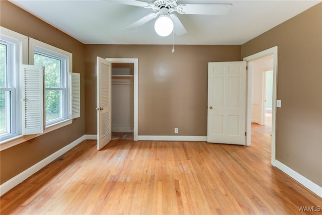 9C Country Club Hls, Tuscaloosa, AL 35401 - unfurnished bedroom with baseboards, light wood-style floors, a closet, and a ceiling fan