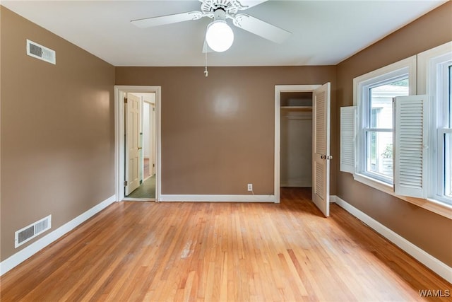 9C Country Club Hls, Tuscaloosa, AL 35401 - unfurnished bedroom with baseboards, light wood-style floors, a closet, and a ceiling fan