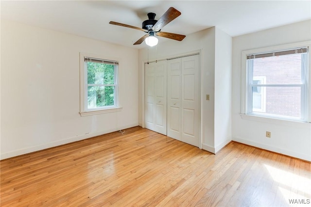 9C Country Club Hls, Tuscaloosa, AL 35401 - unfurnished bedroom featuring light wood-style floors, baseboards, a closet, and a ceiling fan