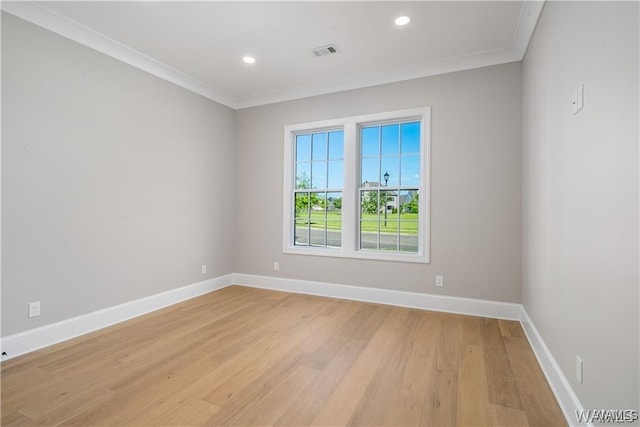 5930 Carleton Park Cir, Tuscaloosa, AL 35406 - unfurnished room featuring baseboards, ornamental molding, visible vents, and light wood-type flooring