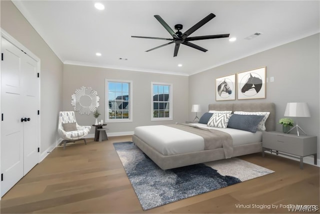 5930 Carleton Park Cir, Tuscaloosa, AL 35406 - bedroom with visible vents, recessed lighting, wood finished floors, and ornamental molding
