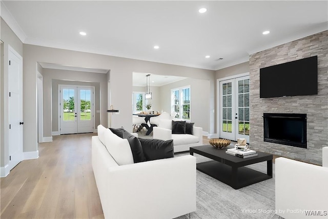 5930 Carleton Park Cir, Tuscaloosa, AL 35406 - living room with french doors, light wood-style floors, and crown molding
