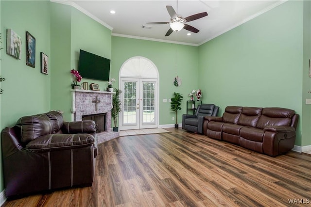 6650 Flatwoods Rd, Northport, AL 35473 - living area with french doors, wood finished floors, ornamental molding, ceiling fan, and baseboards