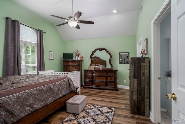 6650 Flatwoods Rd, Northport, AL 35473 - bedroom with lofted ceiling, wood finished floors, baseboards, and ceiling fan