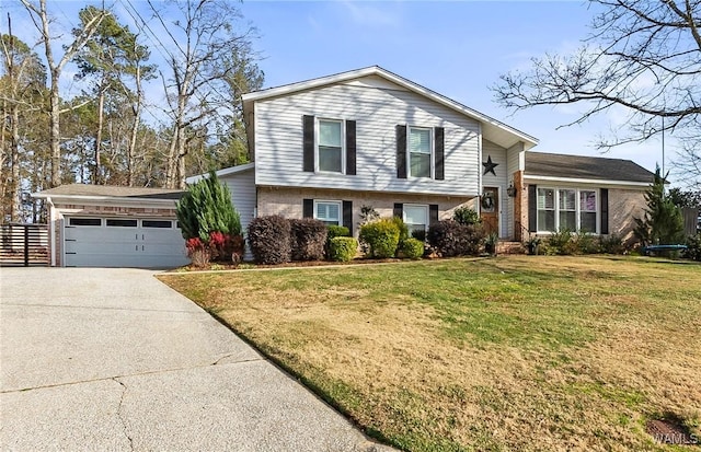 split level home featuring a garage and a front yard