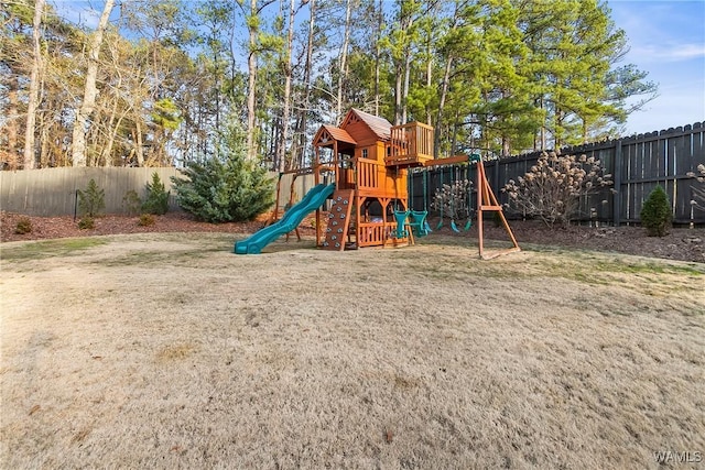 view of playground featuring a yard