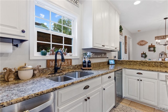 kitchen with white cabinets and sink