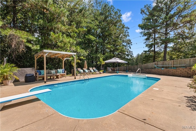 view of swimming pool featuring outdoor lounge area, a diving board, a patio area, and a pergola