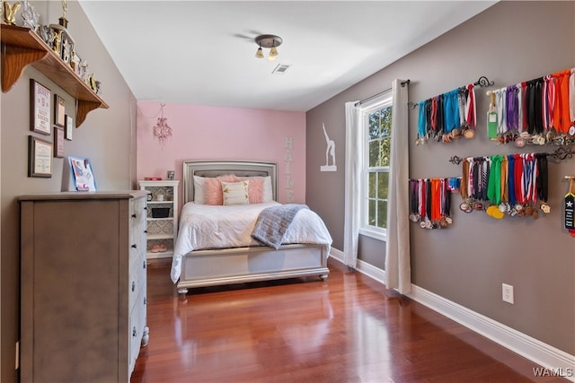 bedroom featuring hardwood / wood-style floors