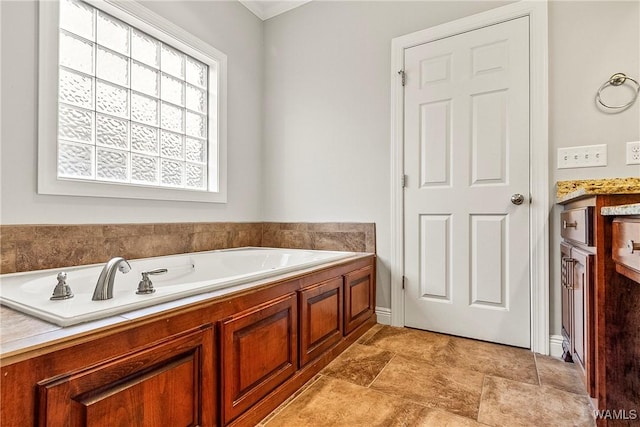 bathroom featuring stone finish floor and a bath