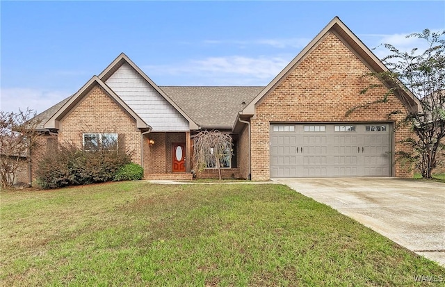view of front of property with an attached garage, concrete driveway, a shingled roof, a front yard, and brick siding