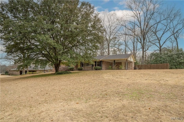 exterior space with a front lawn