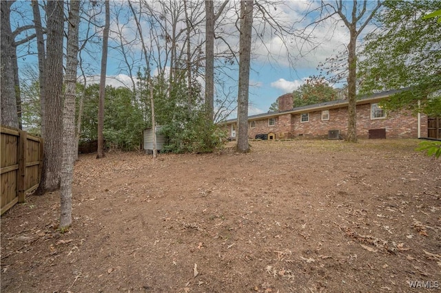 view of yard featuring central AC