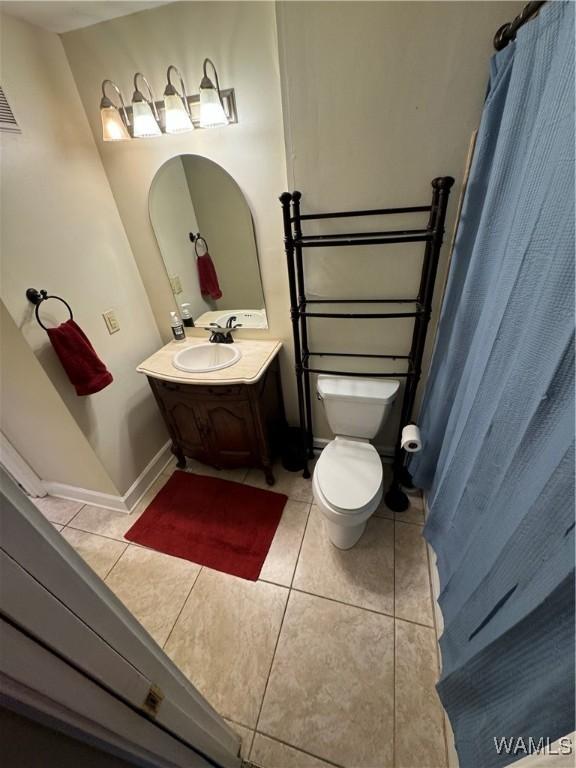 708 11th St Unit 226, Tuscaloosa, AL 35401 - full bath with tile patterned flooring, vanity, and a shower with curtain